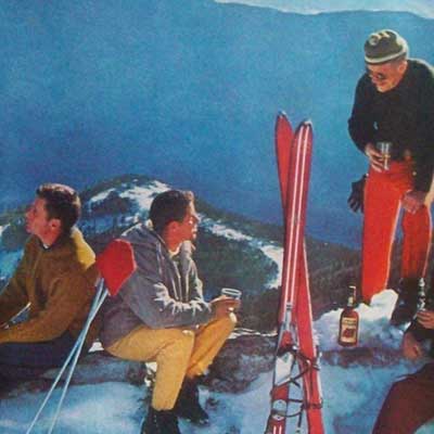 Four Roses Bourbon Ad Featuring Skiers Relaxing in the Mountains